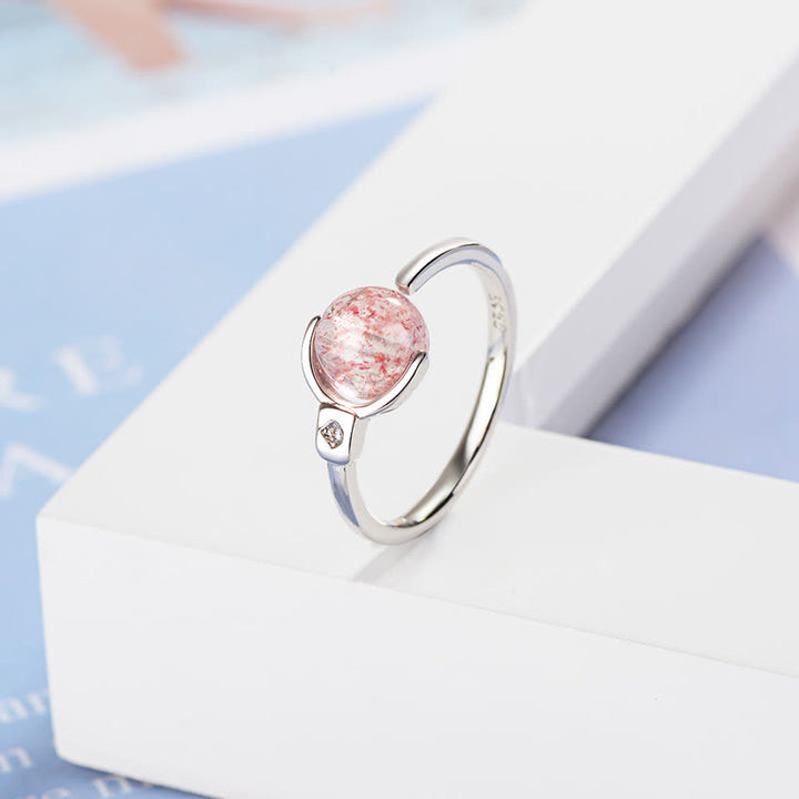 Anillo de rotación calmante de cristal rosa con Buddha Stones