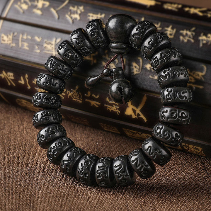 Pulsera de protección de madera con relámpago tibetano de Buddha Stones