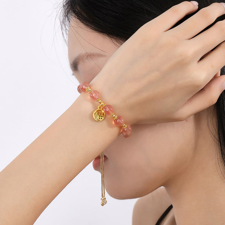 Pulsera con dije positivo de personaje Fu de cuarzo fresa natural chapado en oro de 14 quilates con Buddha Stones