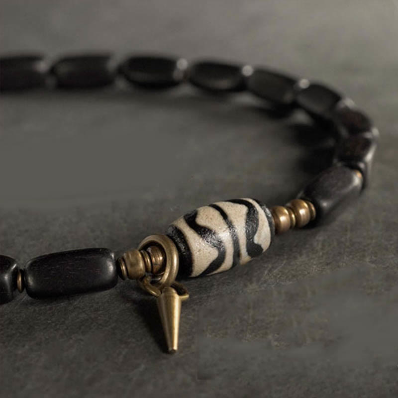 Pulsera de doble envoltura con cuentas Dzi de madera de ébano del Tíbet con Buddha Stones
