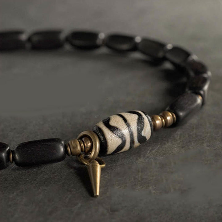 Pulsera de doble envoltura con cuentas Dzi de madera de ébano del Tíbet con Buddha Stones