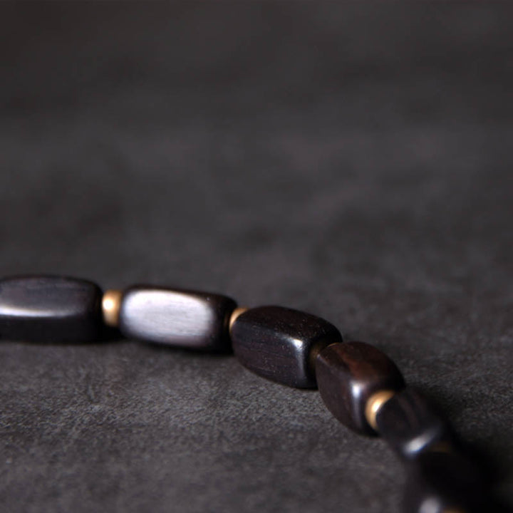 Pulsera de doble envoltura con cuentas Dzi de madera de ébano del Tíbet con Buddha Stones
