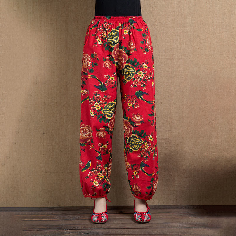 Pantalones bombachos con estampado de flores rojas y verdes de estilo étnico con Buddha Stones y bolsillos