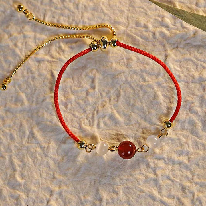 Pulsera de confianza con hilo trenzado y ojo de gato de ágata roja con Buddha Stones - image 4