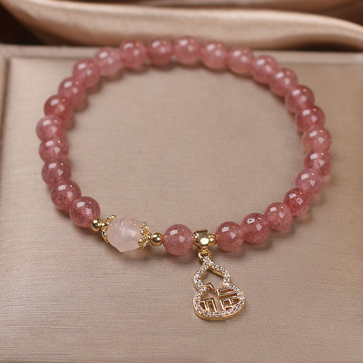 Pulsera positiva con dije de personaje Fu de calabaza de cuarzo fresa con Buddha Stones