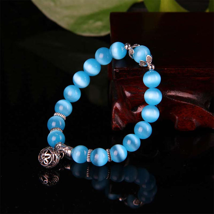 Pulsera de la suerte con ojo de gato tibetano y Buddha Stones