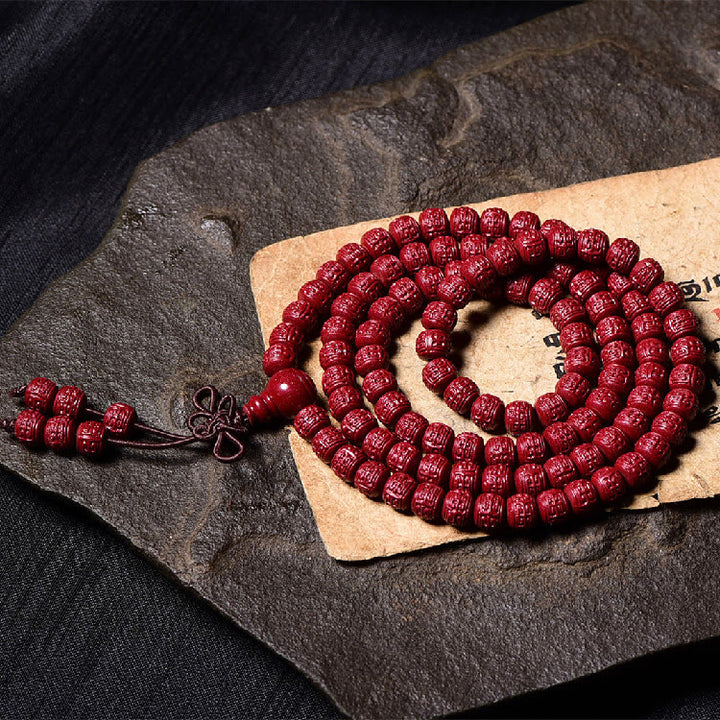 Buddha Stones 108 cuentas Mala cinabrio Om Mani Padme Hum patrón grabado pulsera de bendición
