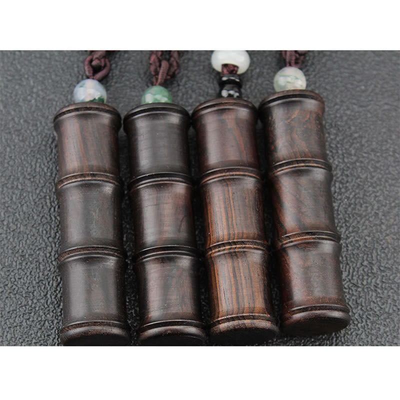 Buddha Stones madera de ébano patrón de bambú Ghau caja de oración collar de paz colgante
