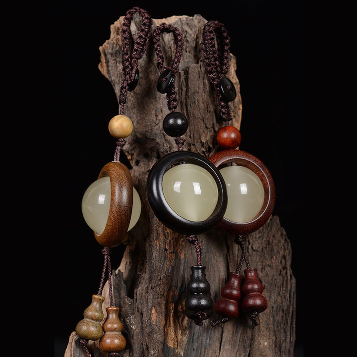 Buddha Stones, sándalo rojo, madera de ébano, sándalo verde, cuentas luminosas de la suerte, calabaza, llavero de la paz
