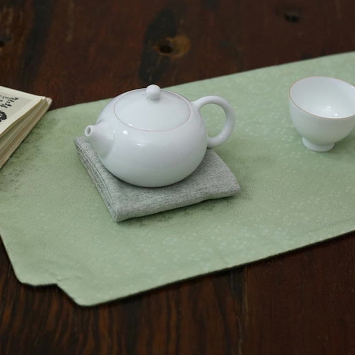 Posavasos para taza de té con diseño de brocado floral elegante