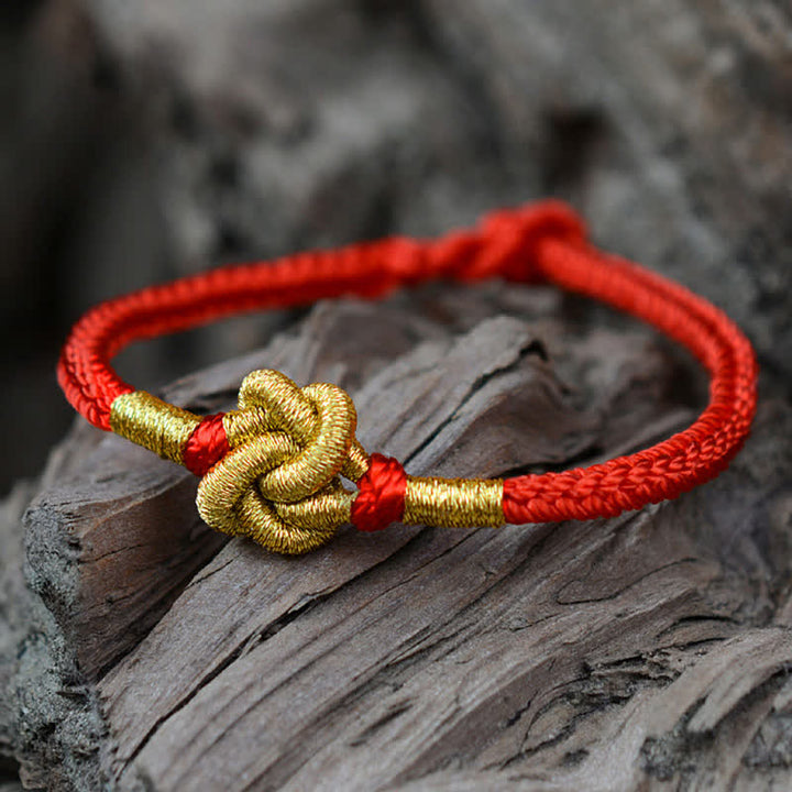 Pulsera de cuerda trenzada de fuerza de la suerte anudada china de diseño simple hecha a mano