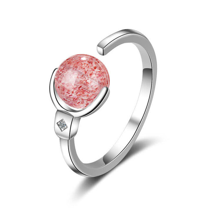 Anillo de rotación calmante de cristal rosa con Buddha Stones
