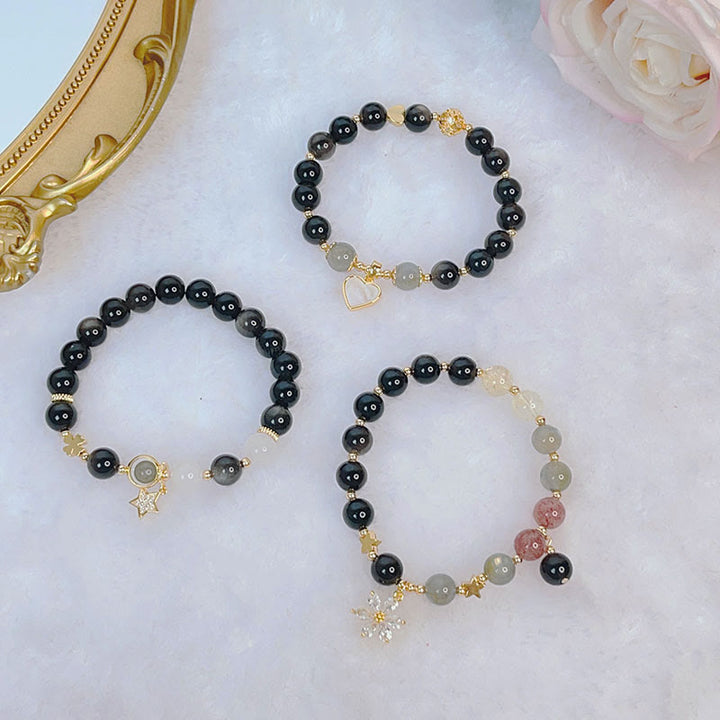 Pulsera de protección de flor de estrella de corazón de amor de obsidiana con brillo de plata natural de Buddha Stones