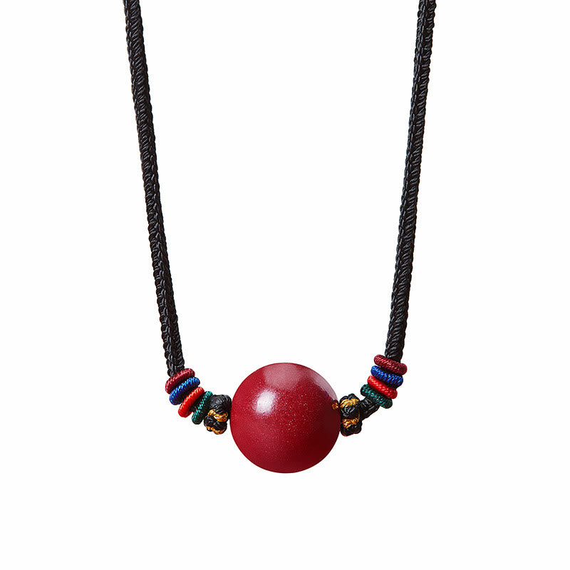 Collar con colgante de cadena con cuentas de cinabrio y Buddha Stones