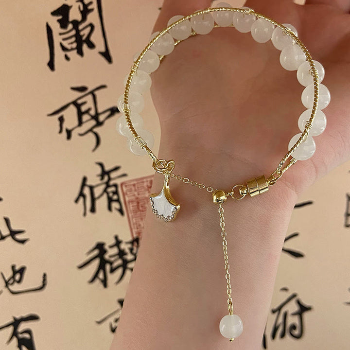 Pulsera de la suerte con cuentas de jade y hojas de ginkgo de Buddha Stones