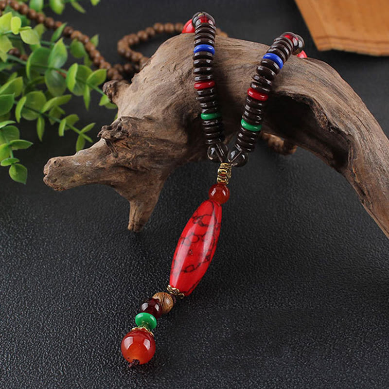 Buddha Stones Madera de wengué Piedra turquesa Protección Calma Collar Colgante