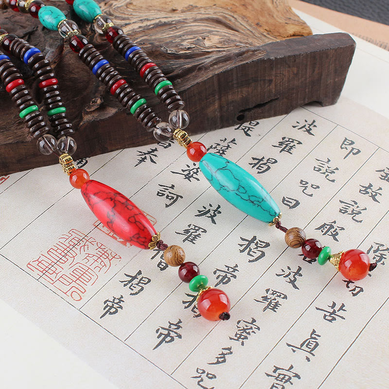 Buddha Stones Madera de wengué Piedra turquesa Protección Calma Collar Colgante