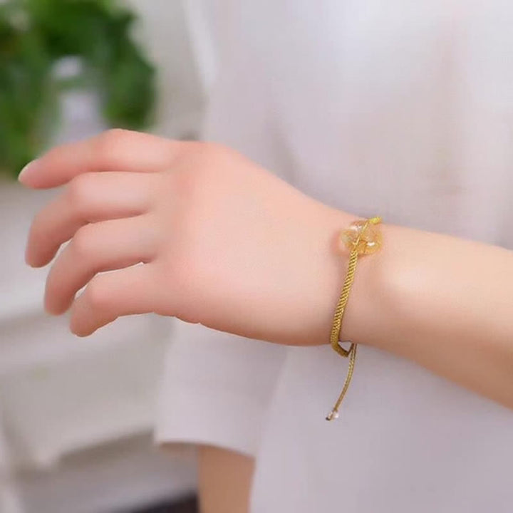Pulsera trenzada de felicidad con hebilla de paz y citrino redondo