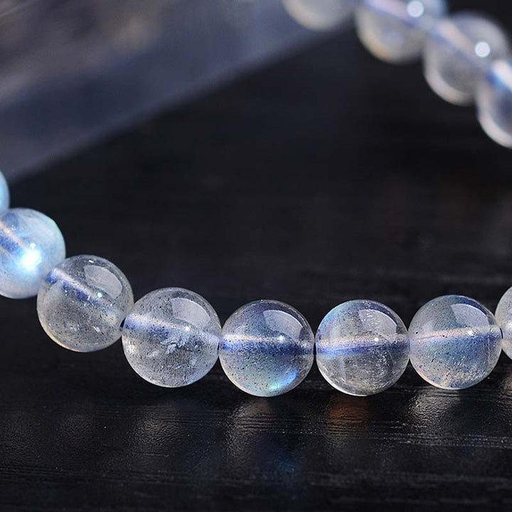 Pulsera de cuentas curativas de piedra lunar natural de piedras de Buddha Stones - image 11