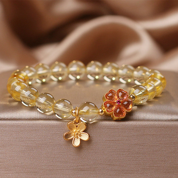 Pulsera de protección de prosperidad con dije de flor de citrino natural con Buddha Stones