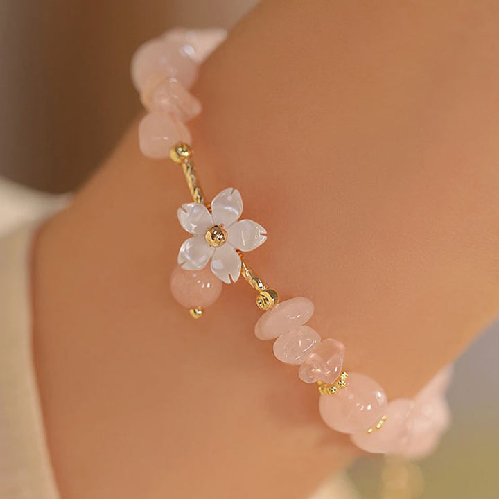 Pulsera de amor con flor de cristal rosa natural chapada en oro de 14 quilates con Buddha Stones