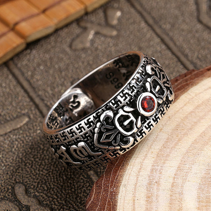 Anillo de riqueza de cobre y rubí tibetano