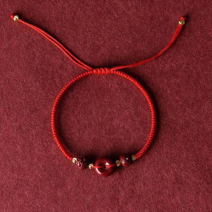 Pulsera trenzada de bendición con hebilla de paz y cinabrio de loto hecha a mano con Buddha Stones