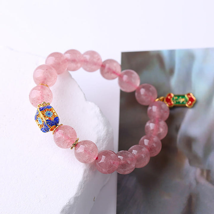 Pulsera con dijes Ruyi positivos de cuarzo fresa y Buddha Stones