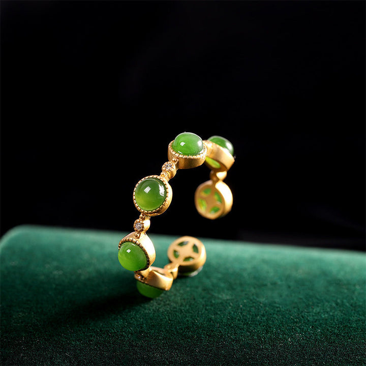 Anillo ajustable calmante curativo de jade cian con Buddha Stones