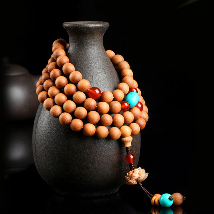Pulsera Mala con dije de iluminación de loto de sándalo tibetano con Buddha Stones