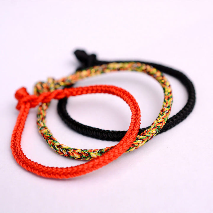Pulsera de cuerda trenzada con protección de nudo de paz de ocho hilos hecha a mano tibetana con Buddha Stones