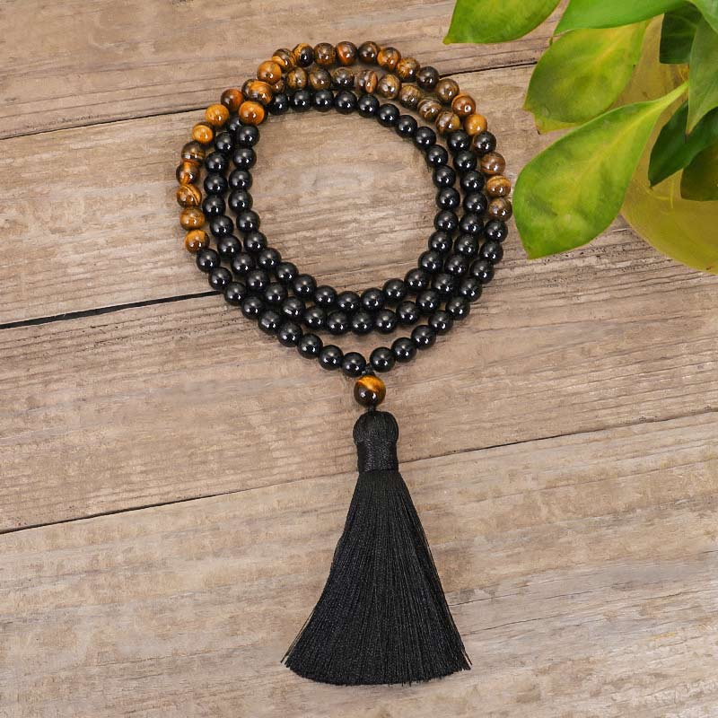Juego de collar de protección de ojo de tigre de ónix negro tibetano con Buddha Stones