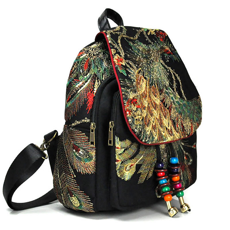 Mochila con borlas de lona con bordado de pavo real