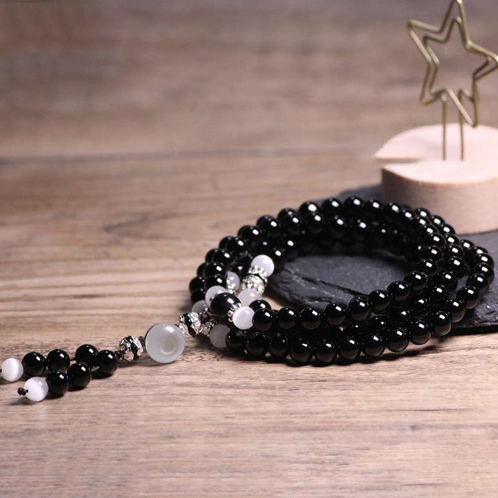 Pulsera de meditación con cuentas de cristal blanco de ónix negro