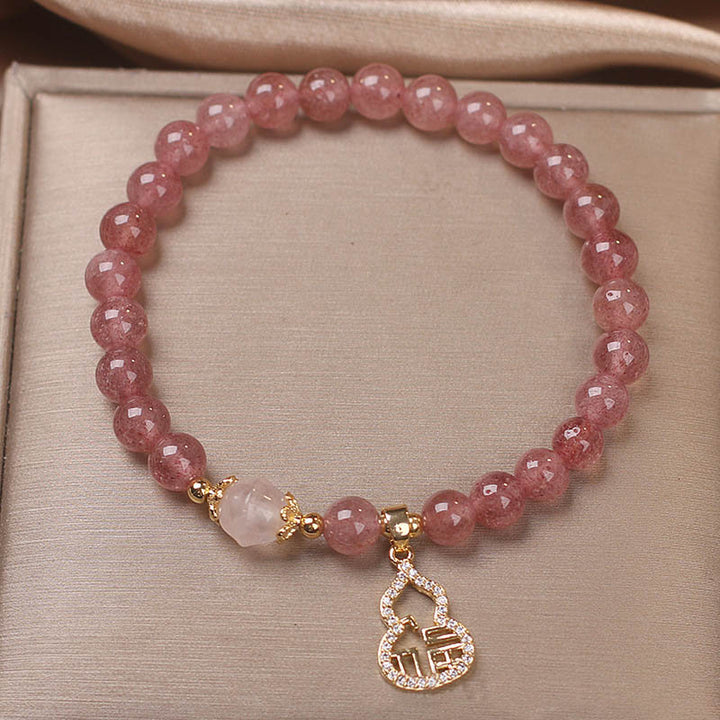 Pulsera positiva con dije de personaje Fu de calabaza de cuarzo fresa con Buddha Stones