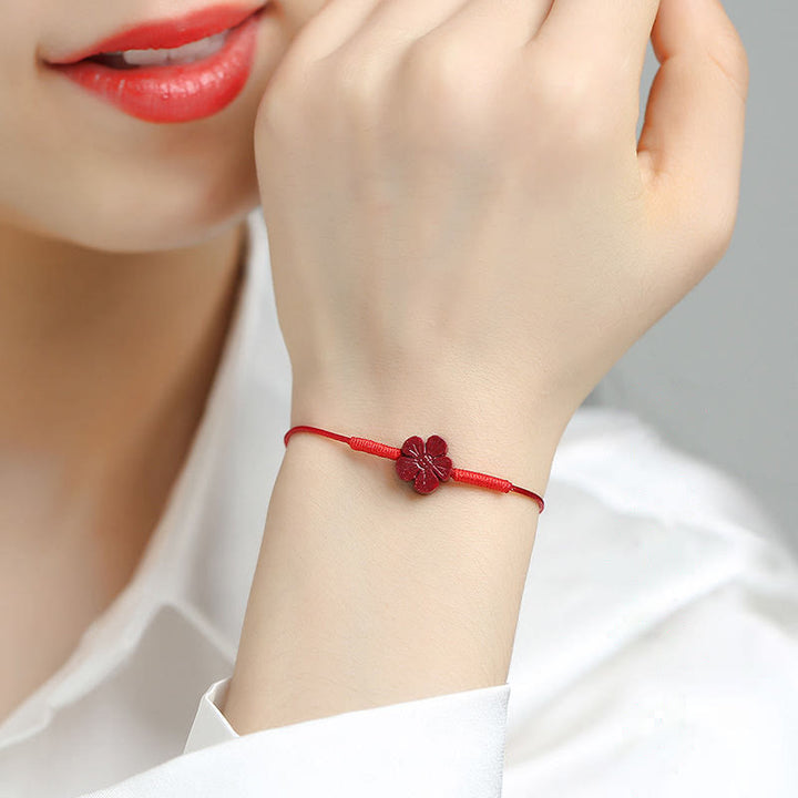 Pulsera trenzada hecha a mano con Buddha Stones, flor de ciruelo, trébol de cuatro hojas, PiXiu, loto, pez Koi, cinabrio