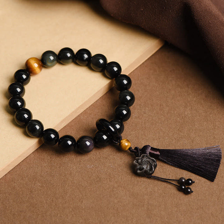 Buddha Stones negra Natural León muñeca Mala protección borlas bolsillo Mala decoración del coche