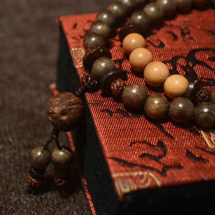 Pulsera Mala con dije de protección de sándalo tibetano - image 11