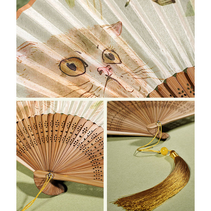 Abanico plegable de bambú de seda de mano con diseño de flores de mariposa y gato bonito de Buddha Stones 21cm