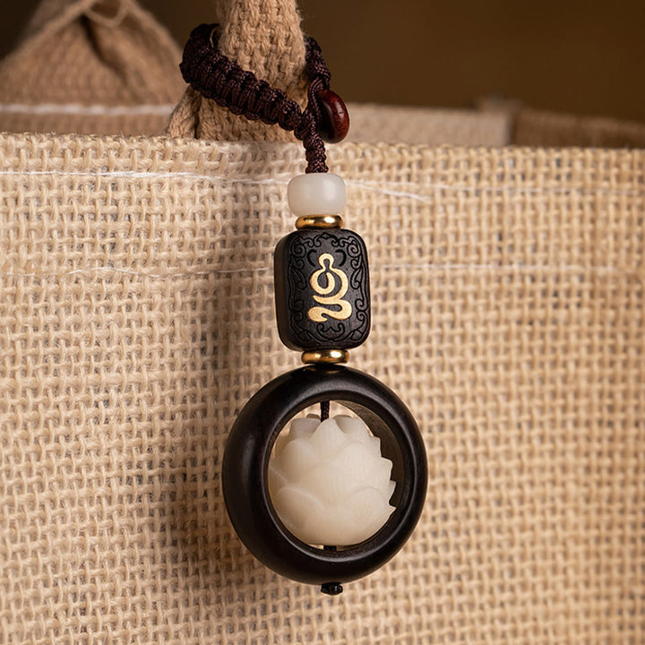 Llavero decorativo con Buddha Stones, madera de ébano, semillas de Bodhi y loto para la iluminación.