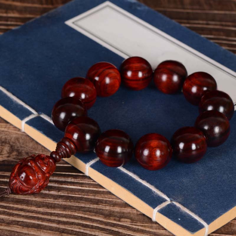 Pulsera de protección del dios de la riqueza de Buda sonriente de sándalo rojo de hoja pequeña con piedras de Buddha Stones