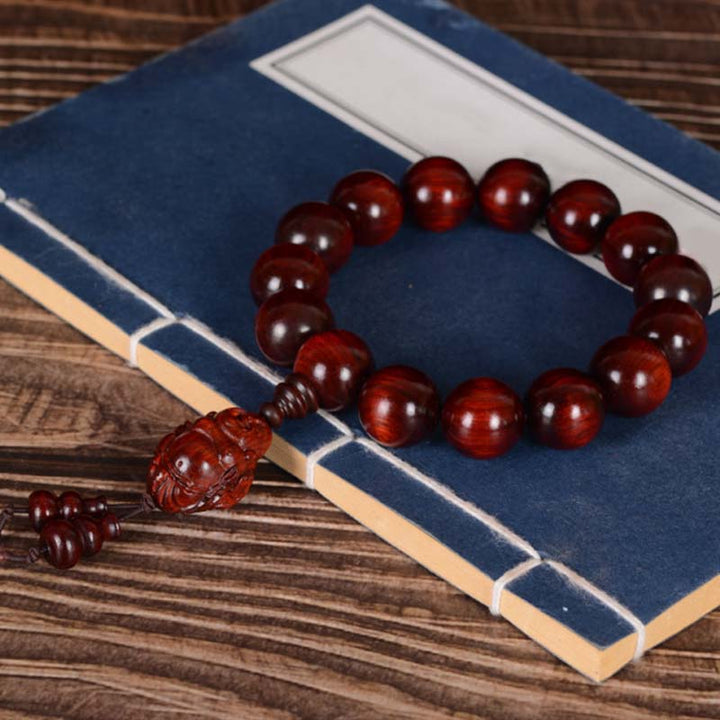 Pulsera de protección del dios de la riqueza de Buda sonriente de sándalo rojo de hoja pequeña con piedras de Buddha Stones