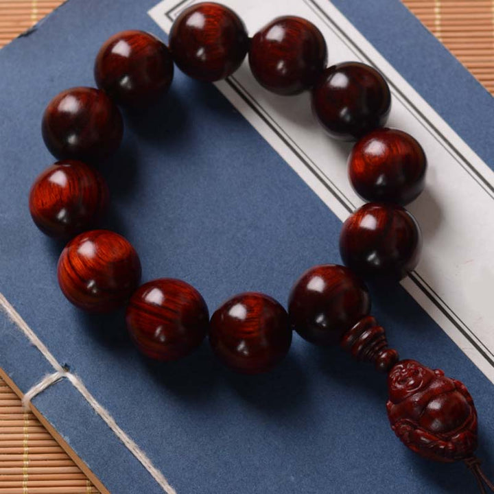 Pulsera de protección del dios de la riqueza de Buda sonriente de sándalo rojo de hoja pequeña con piedras de Buddha Stones
