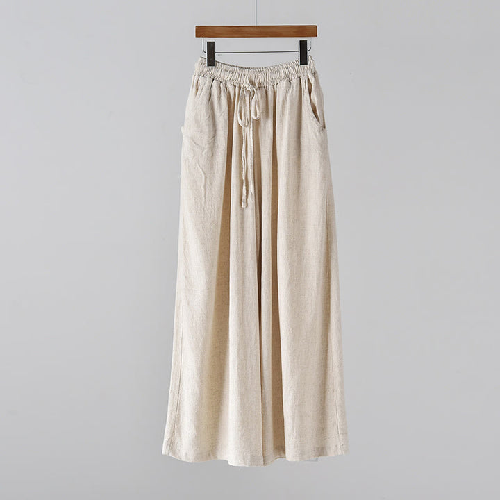 Pantalones anchos con cordón y bolsillos de lino y algodón sueltos con Buddha Stones