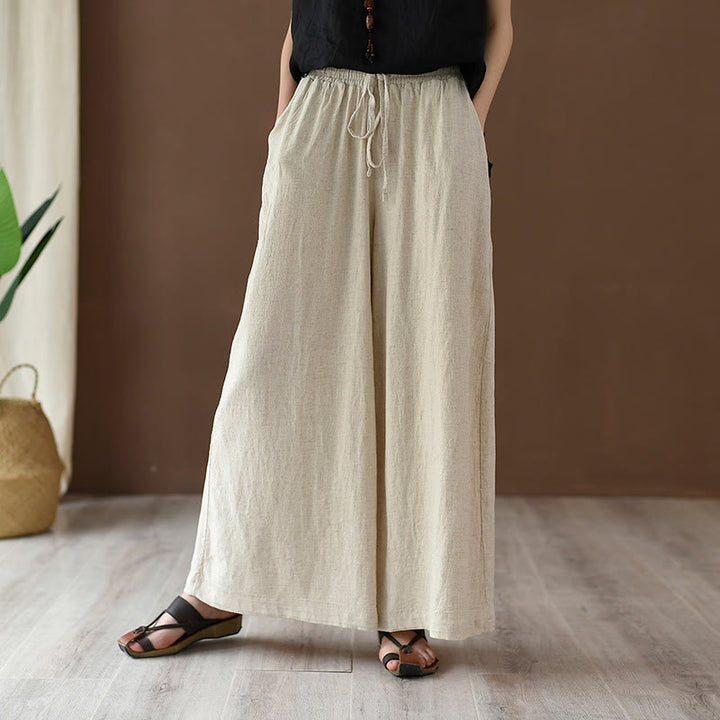 Pantalones anchos con cordón y bolsillos de lino y algodón sueltos con Buddha Stones