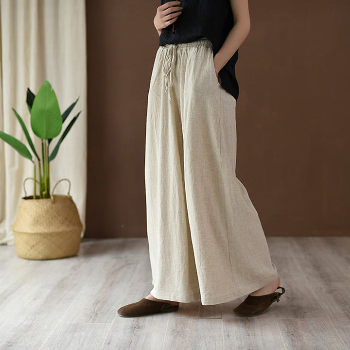 Pantalones anchos con cordón y bolsillos de lino y algodón sueltos con Buddha Stones