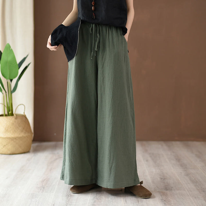 Pantalones anchos con cordón y bolsillos de lino y algodón sueltos con Buddha Stones