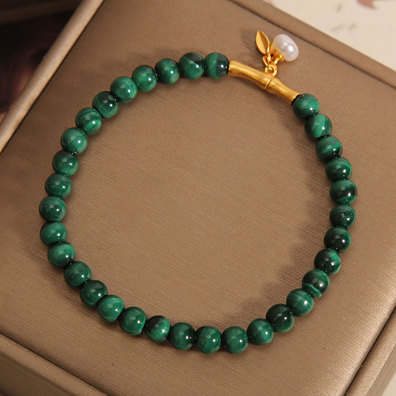 Pulsera antiansiedad de bambú de la suerte con perlas de malaquita natural de Buddha Stones - image 1