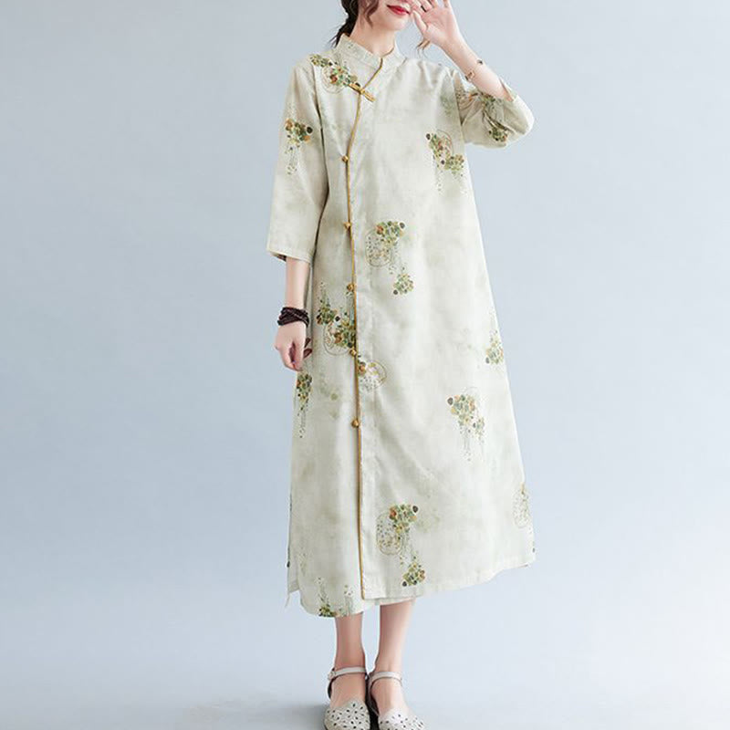 Vestido midi cheongsam con estampado de hojas verdes y amarillas y flores de piedras de Buddha Stones Vestido de manga tres cuartos con bolsillos - image 1