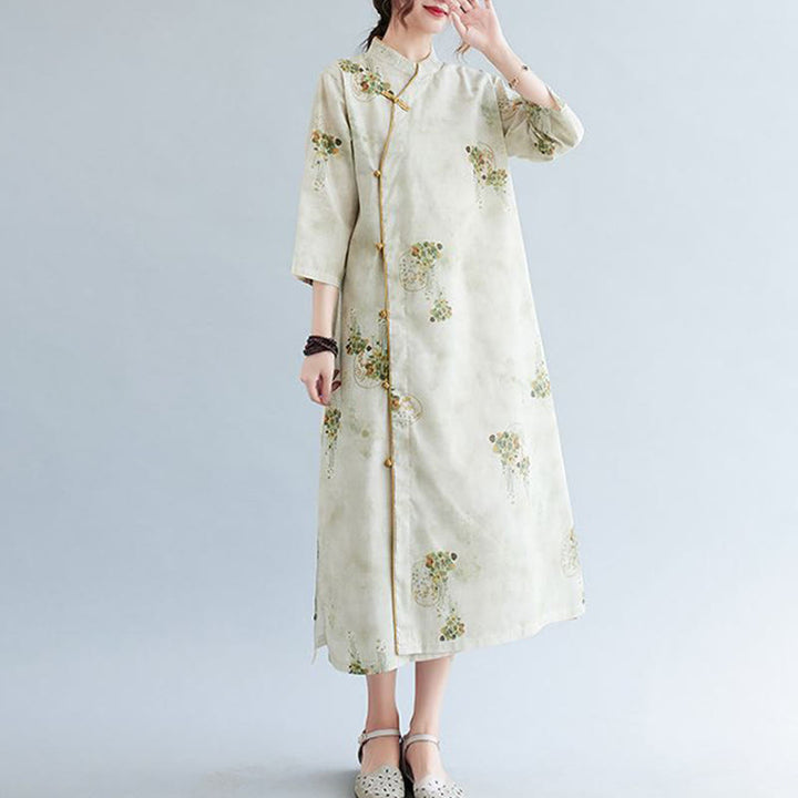 Vestido midi cheongsam con estampado de hojas verdes y amarillas y flores de piedras de Buddha Stones Vestido de manga tres cuartos con bolsillos - image 1